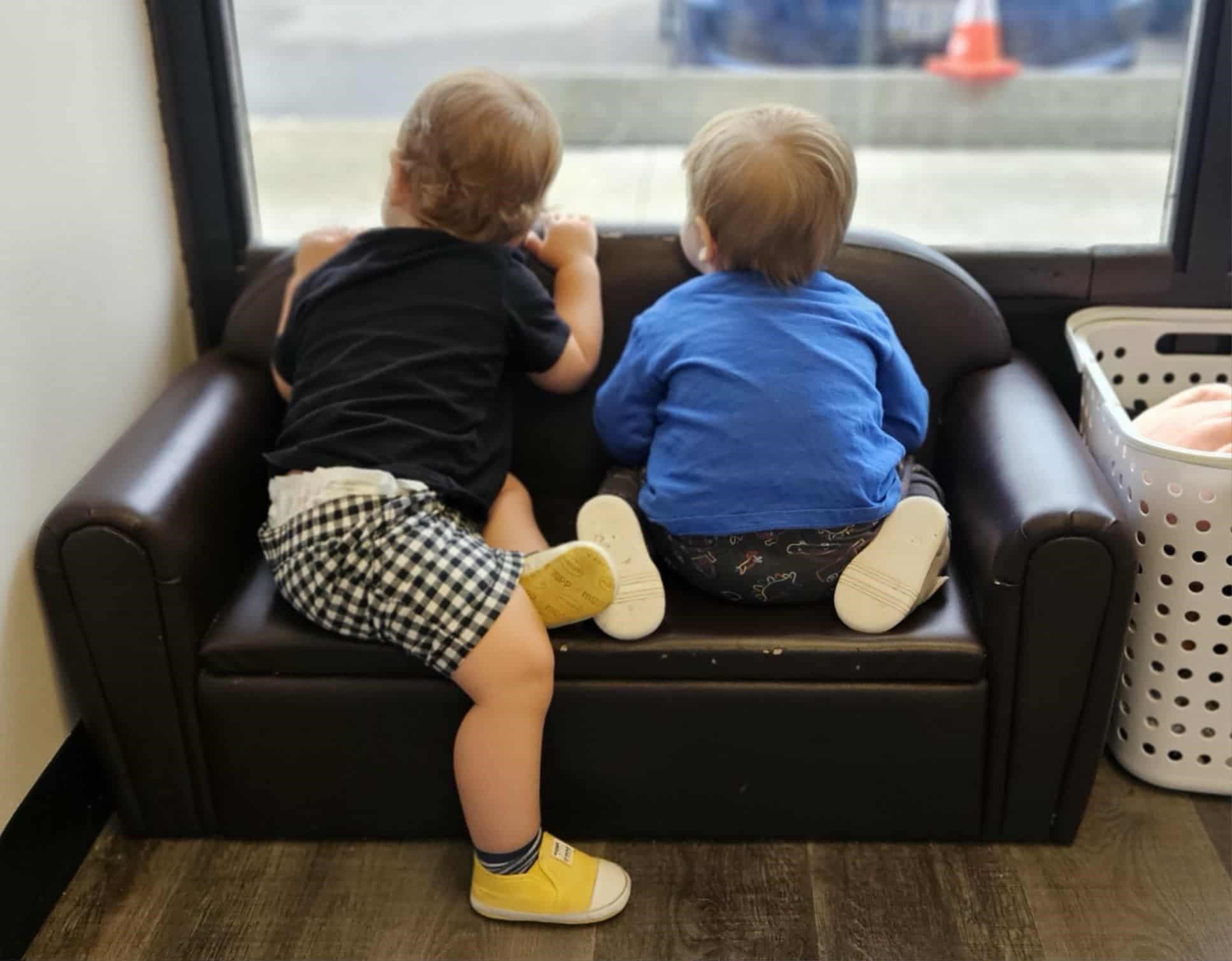 Children watching the cars go by